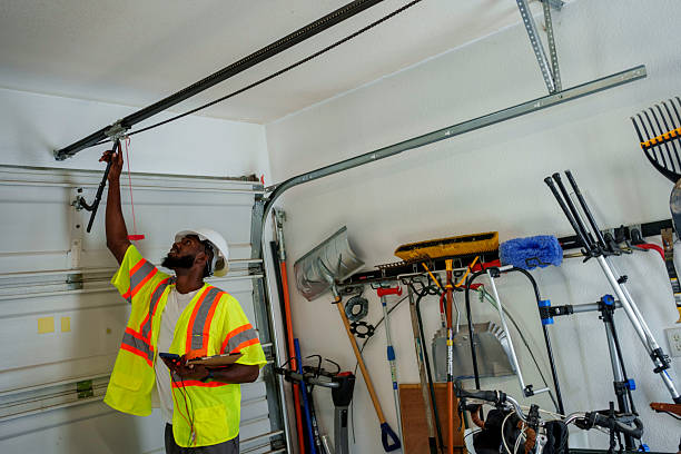 Professional Garage Door Installation technician working in Louisville, OH